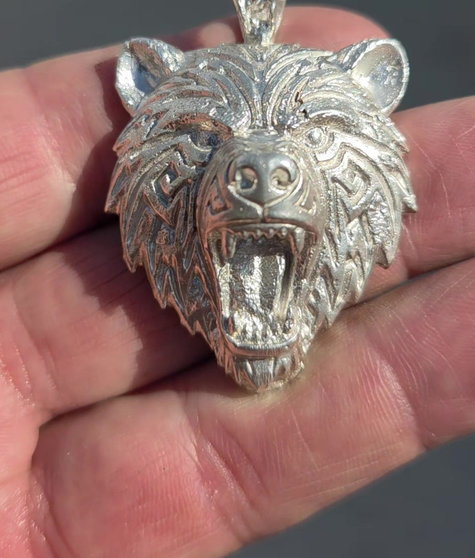 The pendant in daylight, still in the hand